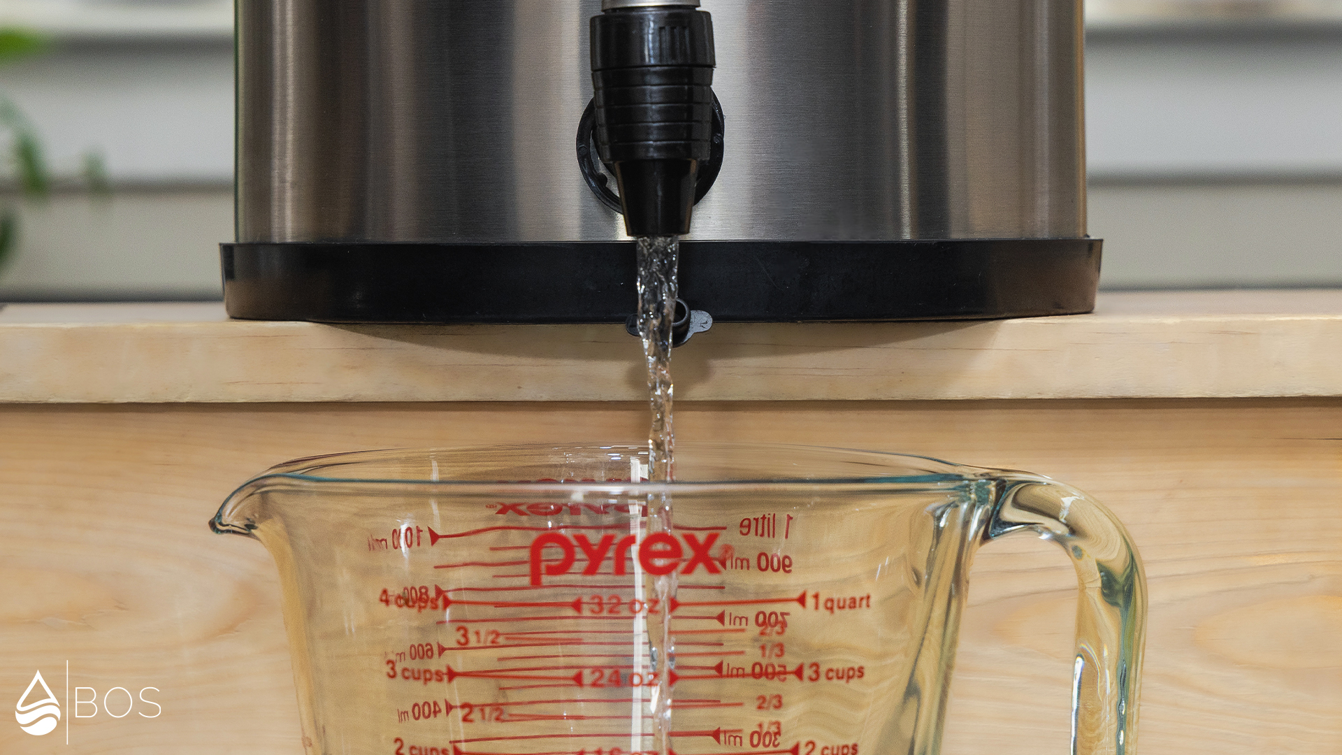 Patriot Pure Ultimate Water Filtration System Dispensing into Measuring Cup