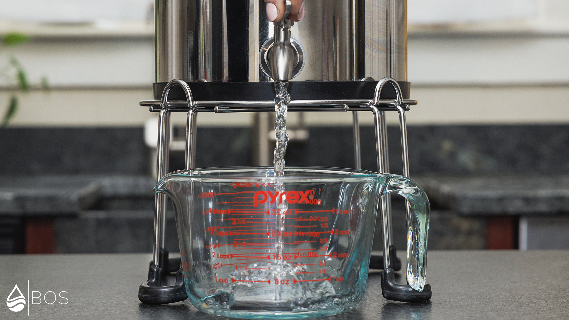 Radiant Life SS Gravity Countertop Filter Dispensing into Measuring Cup