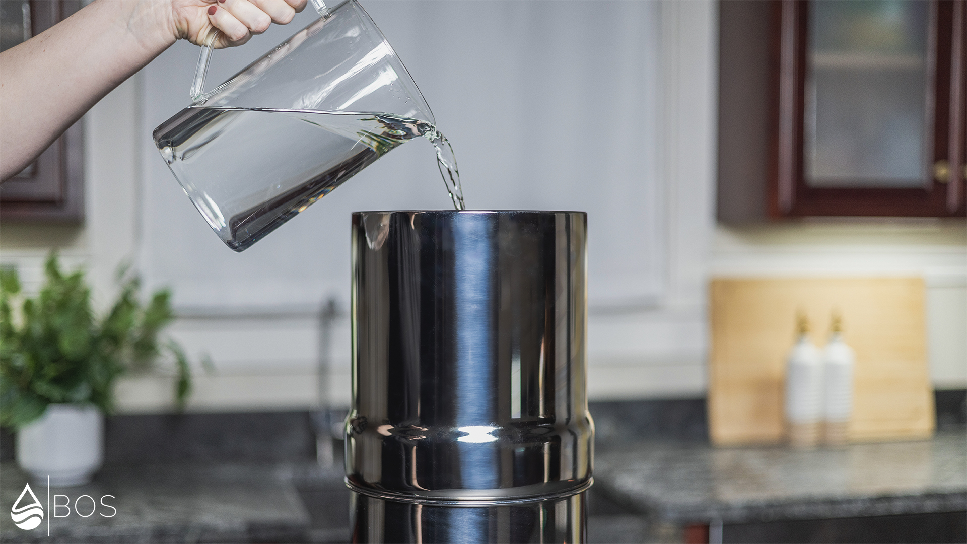 Radiant Life SS Gravity Countertop Filter Filling Upper Tank Using Pitcher