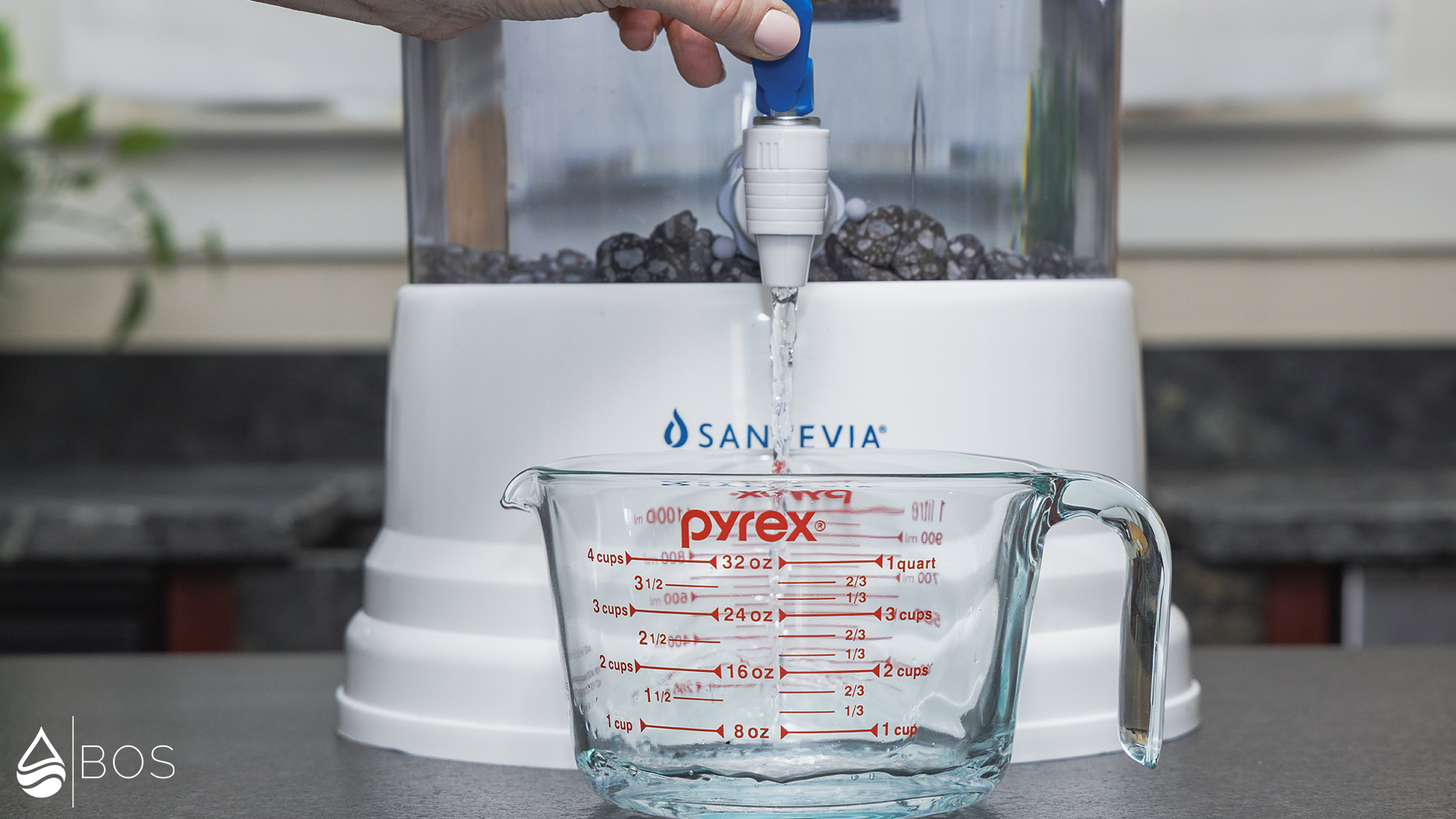 Santevia Gravity Water System Dispensing into Measuring Cup
