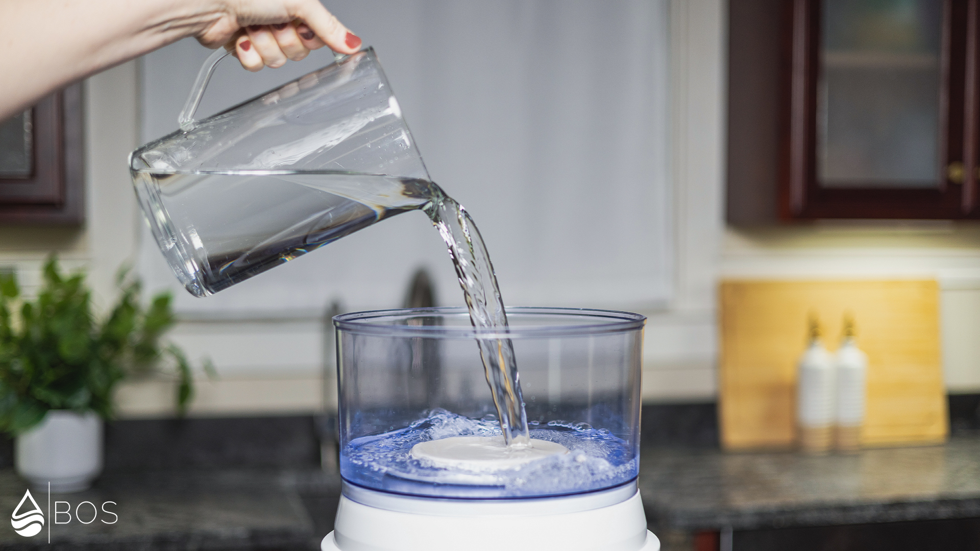 Santevia Gravity Water System Filling Upper Tank Using Pitcher