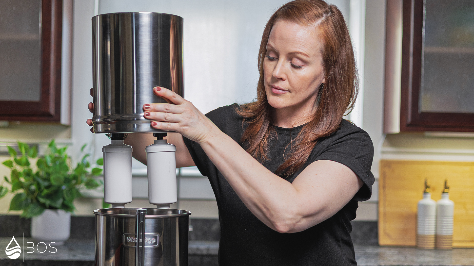 Waterdrop King Placing Upper Tank on Lower Tank with Optional Fluoride Filters Installed